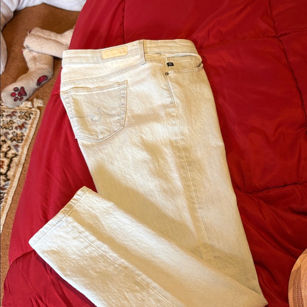 AG bleached blue denim 
 ankle skinny jeans.